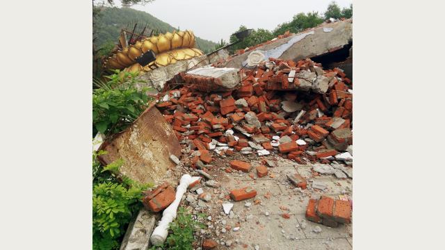 La statue de Guanyin après avoir été détruite,Bouddhisme en Chine